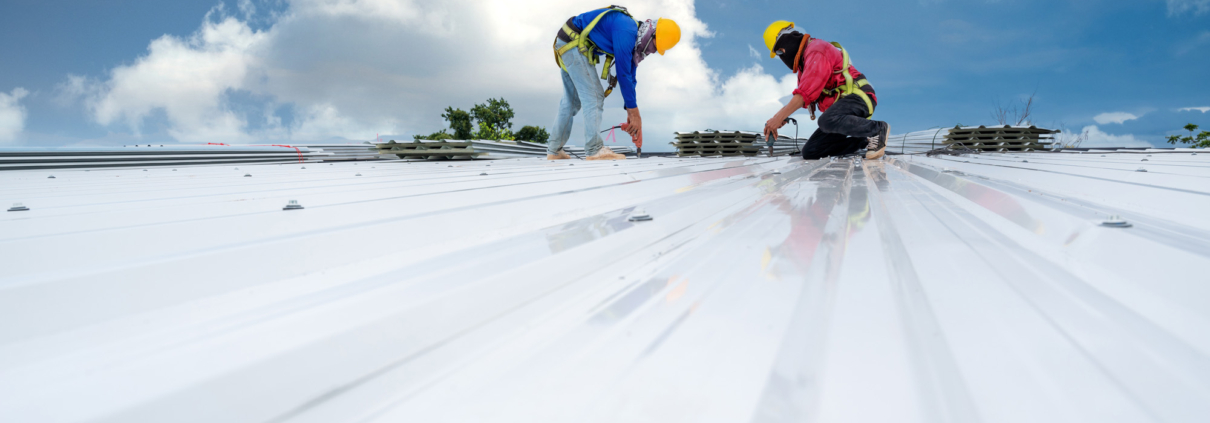 Teamwork of Construction worker install new roof