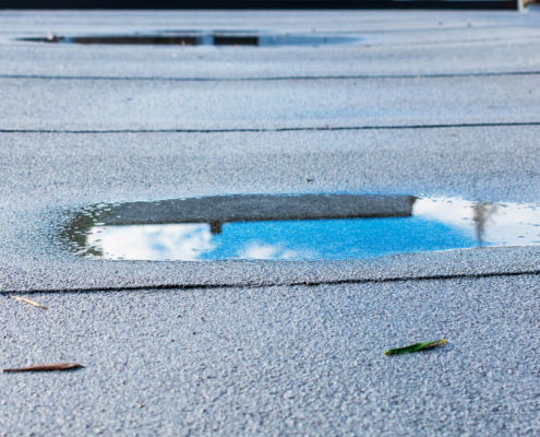 Commercial Roof Water Intrusion: Causes, Risks, and Solutions
